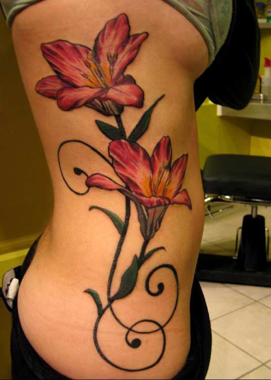 image sexy girl with butterfly lower back tattoo with pink 