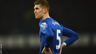 Manchester City are in talks with Everton over the possible signing of England defender John Stones.