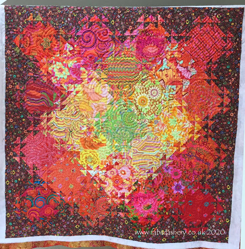 Meg's Shimmering Triangles Quilt