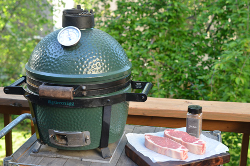 Firing up the Big Green Egg mini-Max to grill some Certified Angus Beef Brand Strip steaks