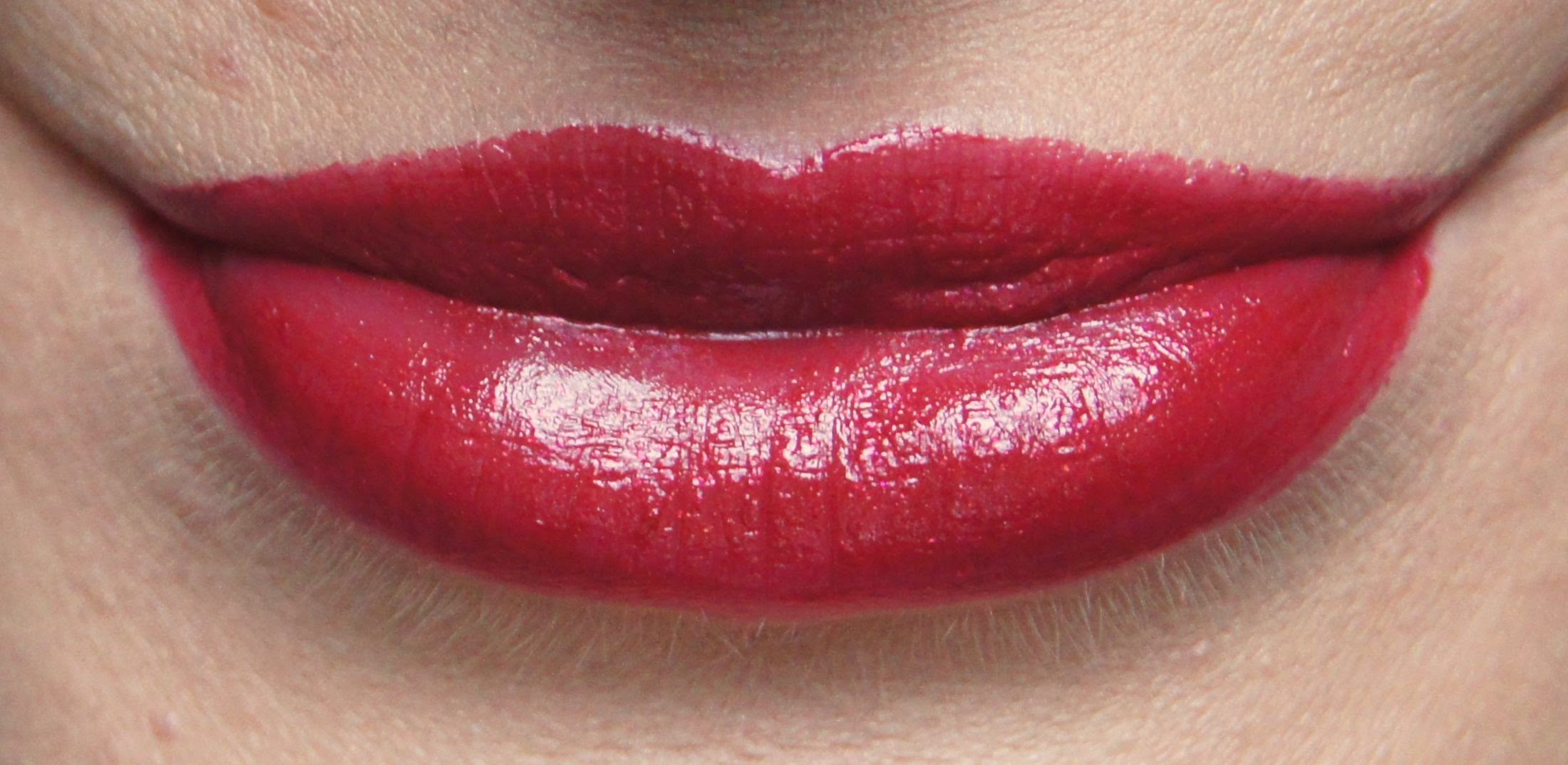 estee lauder pure color vivid shine lipstick forbidden apple swatch review