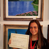 A jovem Ray Rabello, de Teresópolis, Medalha de Bronze com sua obra 'Águas de Bariloche'