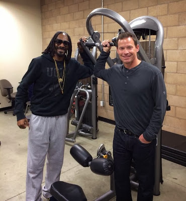 Jim Mora works out with Snoop Lion