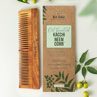 With the Kacchi Neem Wooden Comb from Nat Habit, experience the best hair care available. This multi-action comb, infused with neem, sesame oil, and 17 herbs, helps with frizz control, gloss, and detangling. Suitable for all hair types, each stroke brings you closer to the natural loveliness."