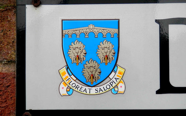 Road sign showing arms of Shrewsbury & Atcham Borough Council