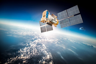 communications satellite orbiting the earth