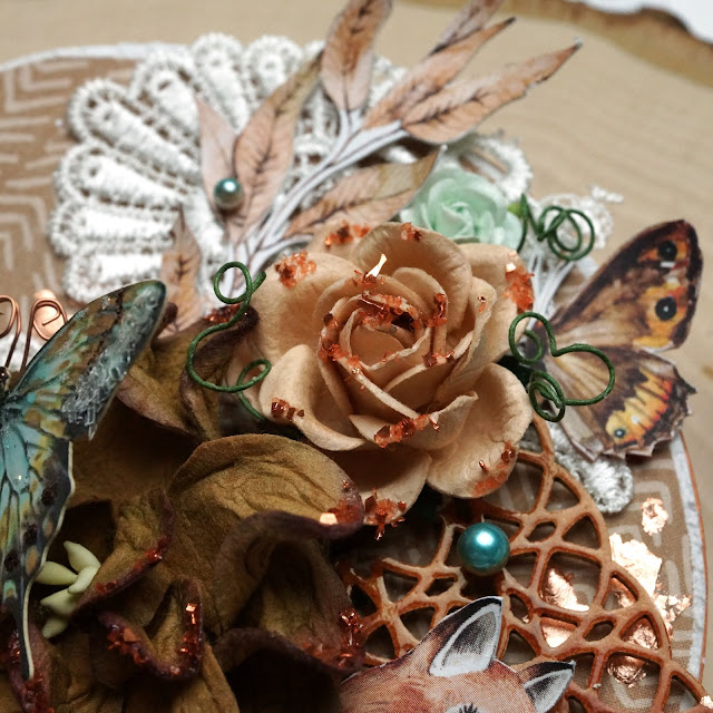 Autumn decor mixed media vignette made with: P13 Forest Tea Party papers; Reneabouquets butterfly, paper flowers, pearls, glitter glass, lace, chipboard; Tim Holtz Distress Glaze and Paint; Scrapbook.com Smart Glue and foam adhesive; Prima Marketing Finnabair copper metallic foil flakes