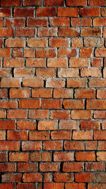 brick wall real photo in  ultra high resolution to use as phone wallpaper