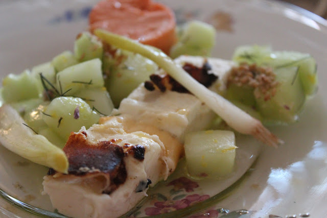 Summer Greek salad: marinated cucumbers, grilled feta, tomato mousse, and pickled young onions