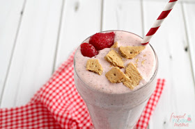 Creamy low-fat yogurt, sweet frozen strawberries, reduced-fat cream cheese and graham crackers are blended into this satisfying Strawberry Cheesecake Smoothie.