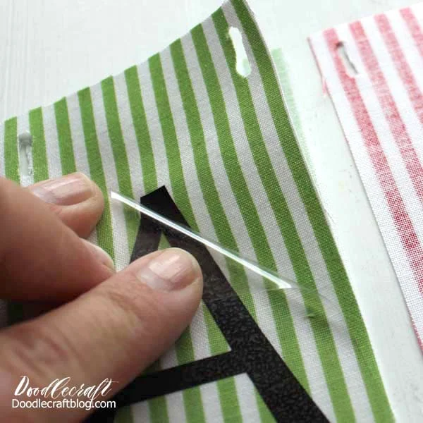 Then let the fabric cool down completely and peel back the plastic carrier sheet. Roll it back over itself for the cleanest removal. If it starts to lift up the vinyl, press it again for a few more seconds.