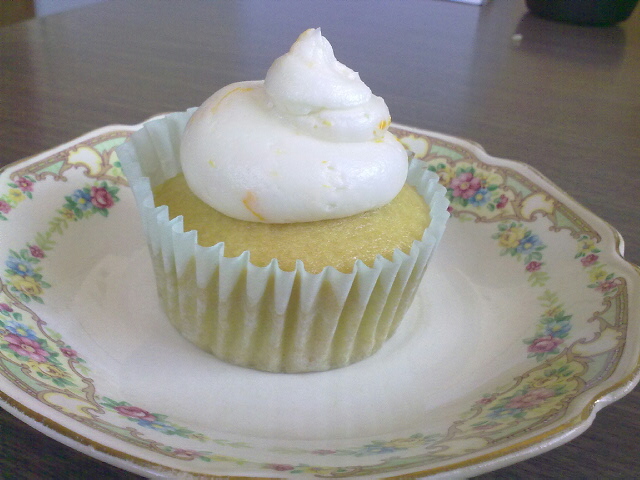 vegan vanilla cupcake with zesty orange frosting!