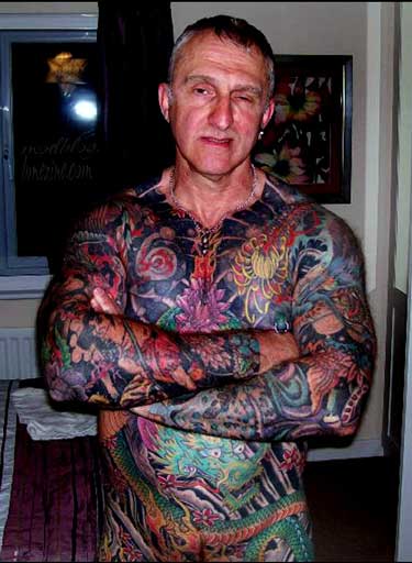  and a girly looking grandpa name tattoo over one who was FULLY tattooed