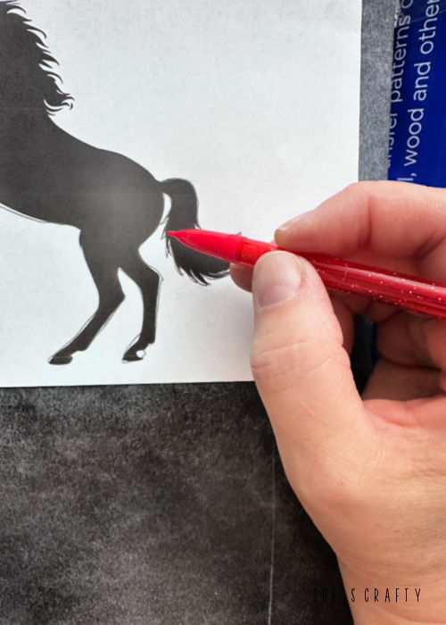 Horse silhouette transferred with graphite paper.