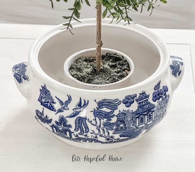 chinoiserie cachepot with topiary.