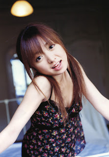 Asami Konno Japanese Cutie Singer Playing On Bed Photo 2