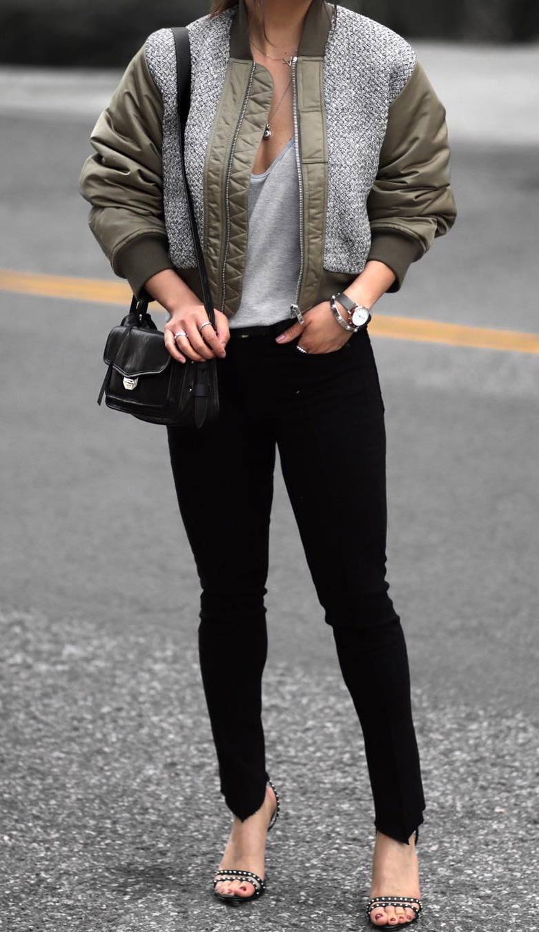 what to wear with a bomber : black bag + skinnies + heels + grey top