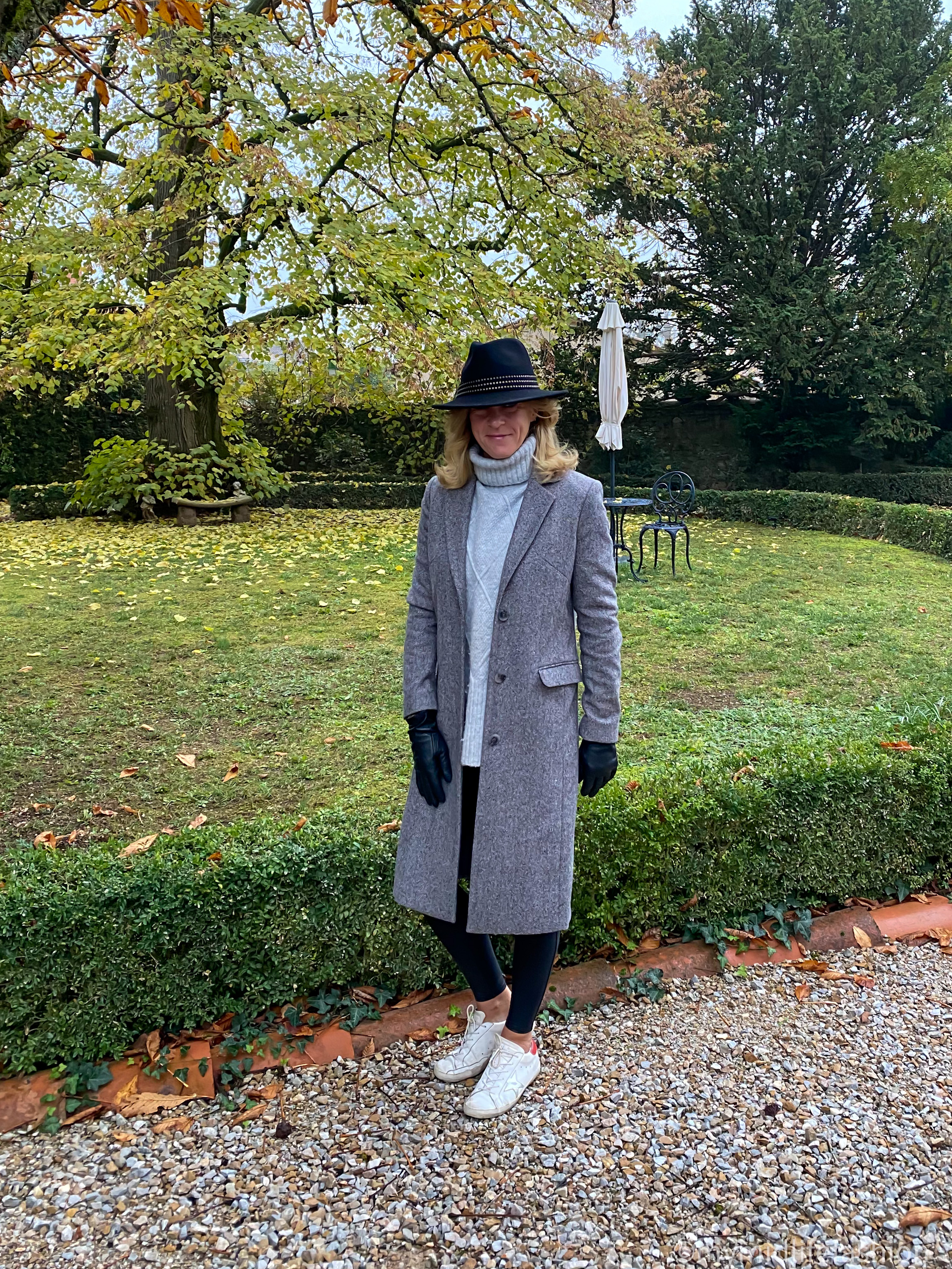 my midlife fashion, John Lewis felt fedora, baukjen overcoat, Wallis polo neck jumper, spanx faux leather leggings, marks and Spencer cashmere lined leather gloves, golden goose superstar low top leather trainers
