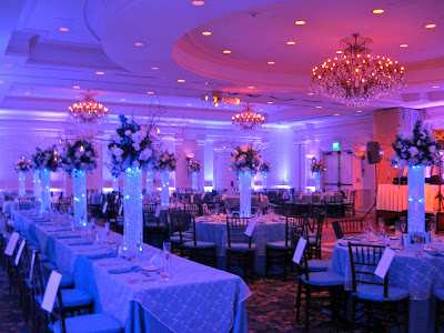 LED lights and gel beads lit the centerpieces in an icy blue tone
