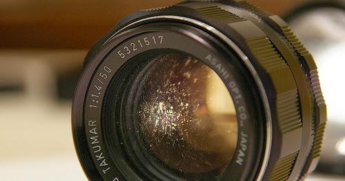 Cara membersihkan jamur  debu di lensa  kamera SLR 