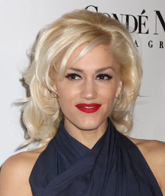 gwen stefani hair. The Gwen Stefani summer hair look seems to always incorporate a bun.