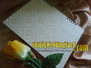 http://www.shidiqweddingcard.com/2013/11/hardcover-harco-sdk-souvenir-buku_7.html