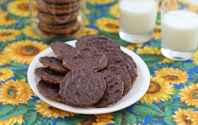 Food Lust People Love: Kakor Chokladflarn or IKEA chocolate oatmeal cookies are a special treat we usually buy at that famous Swedish superstore but they are really quite easy to make at home. The bonus, of course, is that you know exactly what is in these. (Read: no palm oil or odd additives.) These delectable delights are crispy thin oatmeal cookies with dark chocolate sandwiched between them. In my copycat version, I leave them single file. You get more dark chocolate with each bite that way. Which is always a good thing.