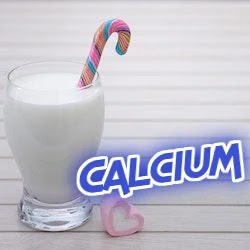 calcium : A glass of yogurt near a marshmallow in The Shape of a heart