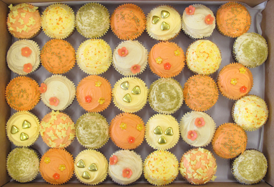 Here's some delightful orange yellow and gold big cupcakes we did for Faye