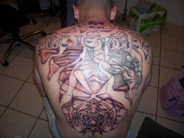 and an unfinished chest piece. P.S. I Pierce at a local tattoo shop. Mayan themed back piece tattoo.