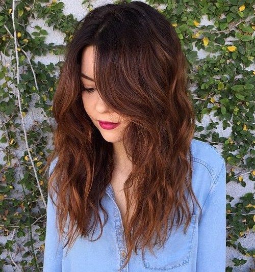 Ombre hair with dark roots to chestnut brown