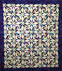 Pam O'Kane's Scrappy Batik Snails Trail Quilt
