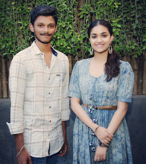 Keerthy Suresh in Blue Dress with Cute and Lovely Smile with a Fan 1