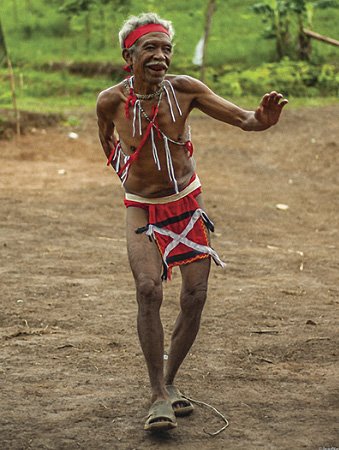 Agta elder performing a native dance