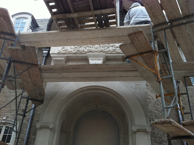 Under construction front entrance with limestone architecture at Enchanted Home chateau