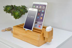 same box-like charging station as above with an attachment that holds an AirPod case