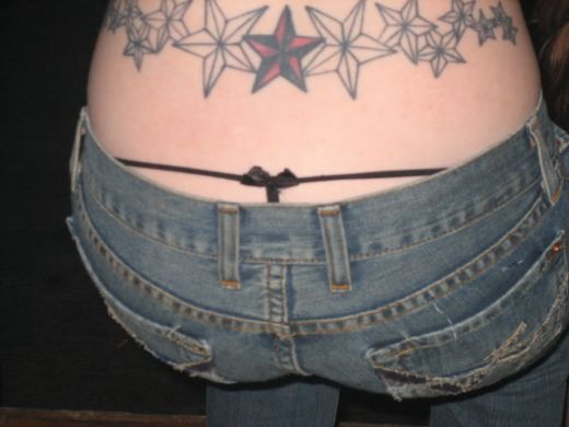 tattoos for girls on back stars. Lower Back Star Tattoos