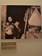 Another sad image of a Mother and her children.