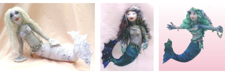 White and blue fabric sewn mermaid dolls.