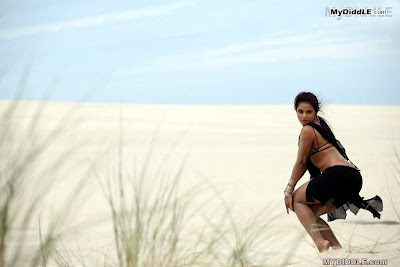 Neetu Chandra in a Bikini Top in a Desert image