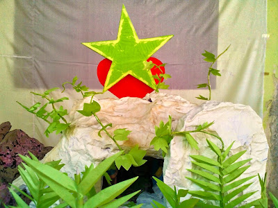 This picture is about Christmas Crib, based on the theme: "I am the resurrection and the Life."