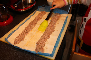 making homemade sausage rolls