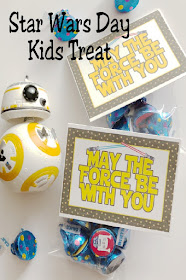 Celebrate Star Wars Day with this fun and simple treat for your kids' lunchboxes or family dinner party.  These Star Wars bag topper printables are a fun addition to any party favor by adding the Star Wars kisses or any Star Wars treat. Such an easy and fun way to make anyone's day a little more awesome. #starwars #hersheykisslabels #kisslabels #hersheykisses #bagtopper #maythefourth #diypartymomblog