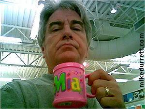 Photo: Mike with his personalized Mia mug.