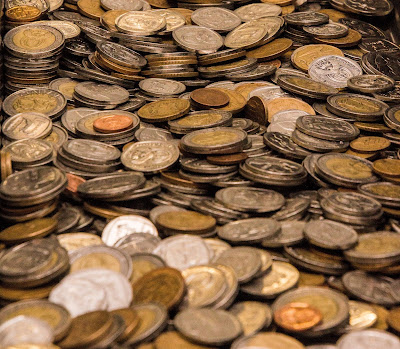 Coins (Credit: Hush Naidoo/Unsplash)