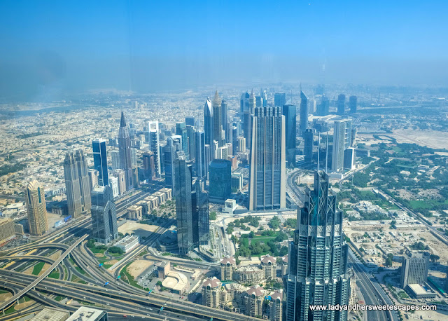 view of Dubai skyscrapers from Atmosphere Burj Khalifa