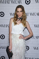 Jaime King in feather skirt over a silk white top paired at the Who What Wear x Target Launch Party red carpet dress