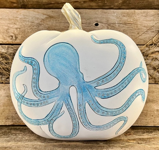 white resin pumpkins with coastal designs