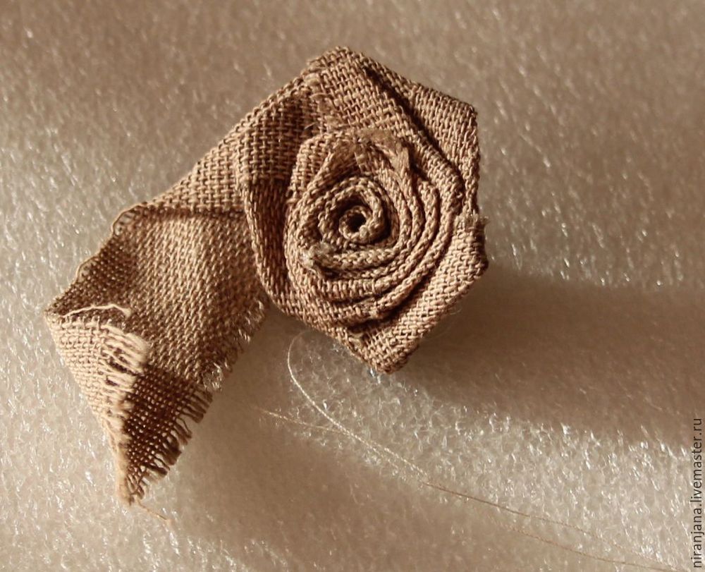 How easy and quick to sew a rose from a fabric or satin ribbon.