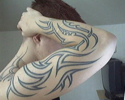 This is Full Arm Tribal Tattoo Design engraved on the Arm it is much trendy